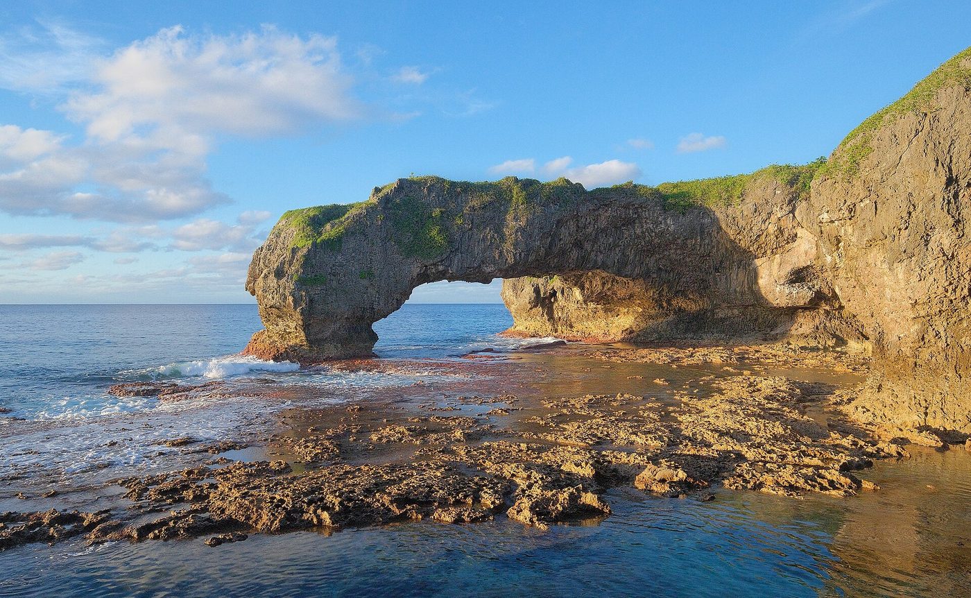 Reef towards Talava Arch at sunset, Niue